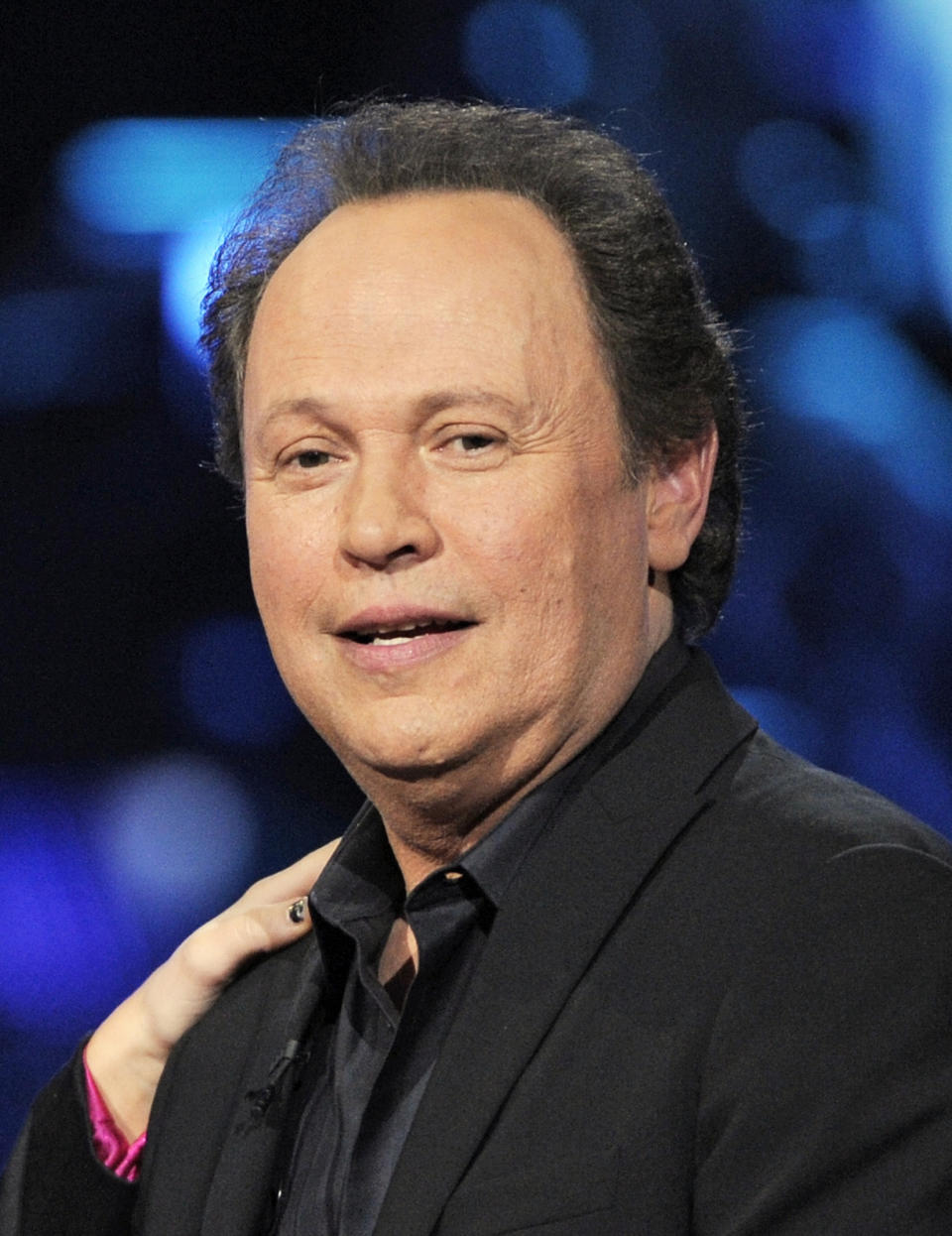 FILE - In this April 6, 2008 file photo, Billy Crystal is shown at the "Idol Gives Back" fundraising special of "American Idol" in Los Angeles. Actor Billy Crystal has helped raise $1 million to rebuild a beach town on New York's Long Island hard-hit by Superstorm Sandy, Saturday, June 22, 2013.(AP Photo/Mark J. Terrill, file)