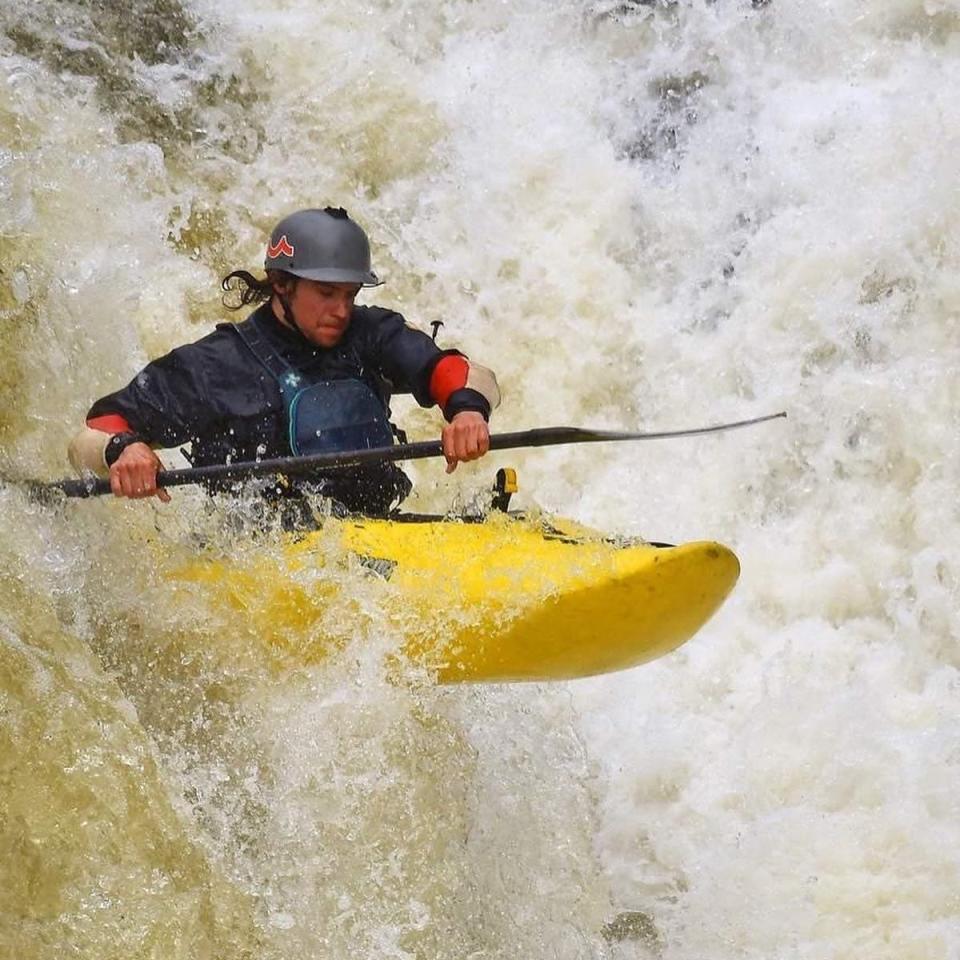 Tommy Piros going over a waterfall at this year's Cuyahoga Falls Fest.