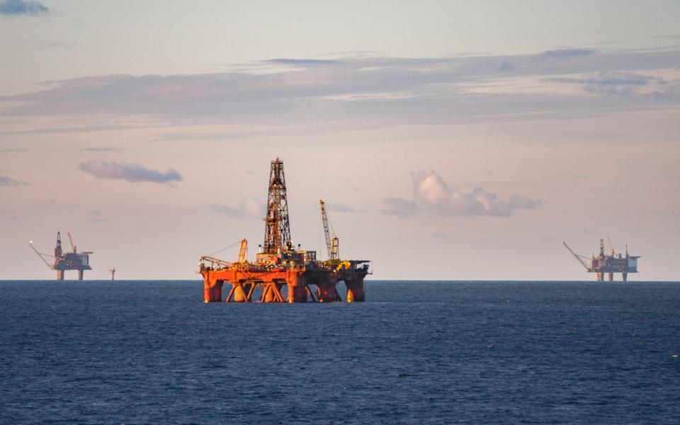 Oil rig production platforms at sea - iStockphoto 