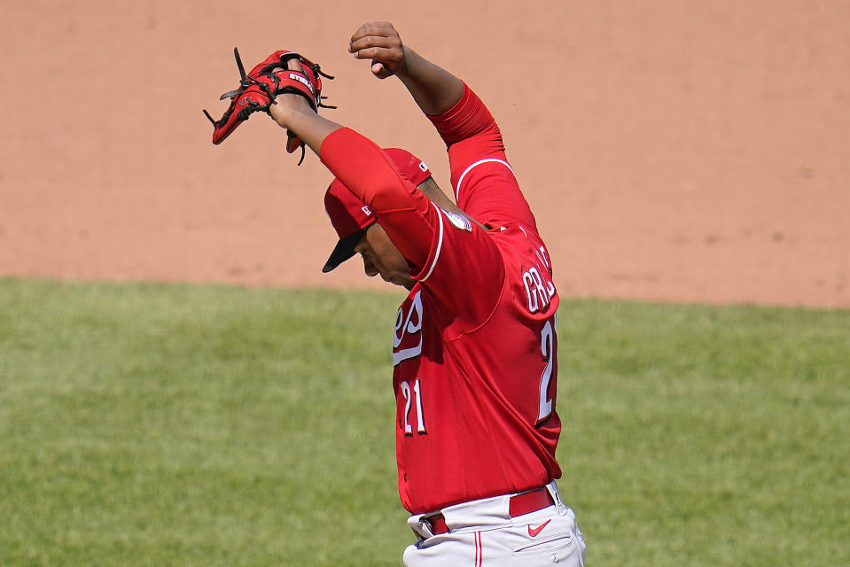 Cincinnati Reds starting pitcher Hunter Greene waits for manager David Bell to remove him during the eighth inning of a baseball game against the Pittsburgh Pirates in Pittsburgh, Sunday, May 15, 2022. The Pirates won 1-0. (AP Photo/Gene J. Puskar)