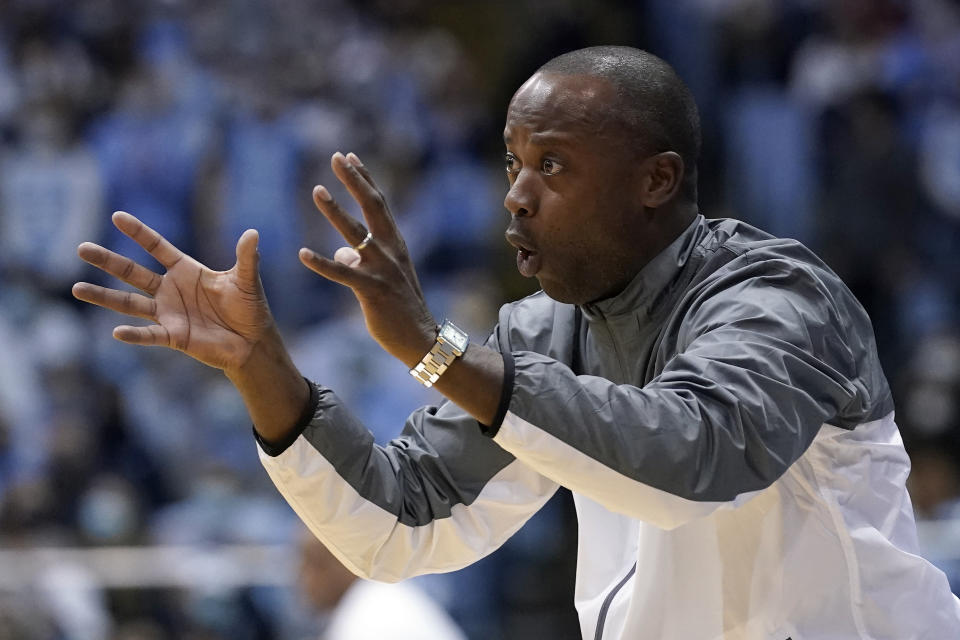 FILE - Boston College head coach Earl Grant reacts during the first half of an NCAA college basketball game against North Carolina in Chapel Hill, N.C., Wednesday, Jan. 26, 2022. Boston College is hoping continuity leads to more success in the second year under coach Earl Grant. (AP Photo/Gerry Broome, File)