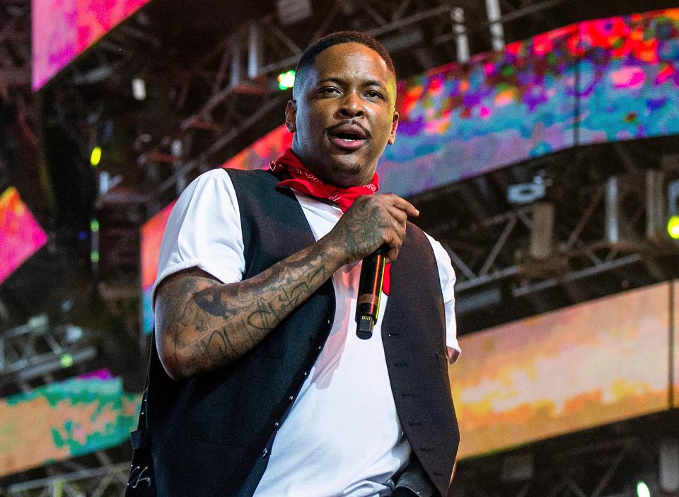 Rapper YG performs was arrested Friday at his Los Angeles home on suspicion of robbery just days before his scheduled Grammy Awards performance.