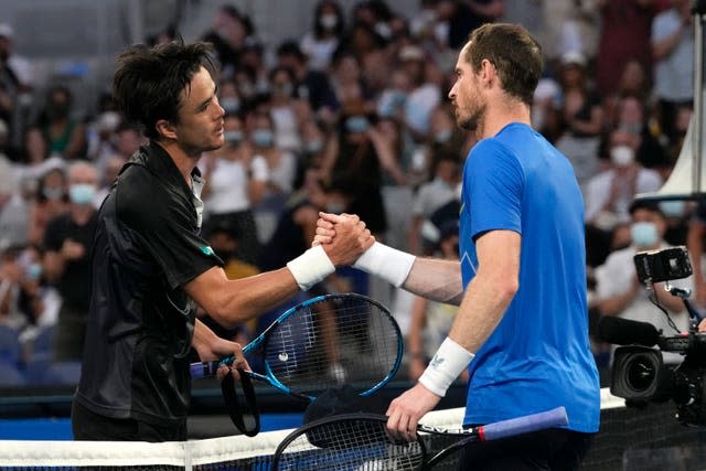 Andy Murray, right, bowed out of the tournament after defeat by Taro Daniel