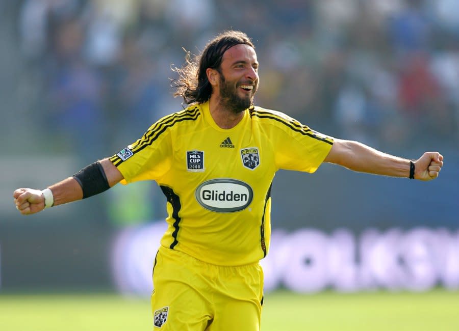 CARSON, CA – NOVEMBER 23: Gino Padula #4 of the Columbus Crew celebrates a first half goal by teammate Alejandro Moreno (not in photo) during the 2008 MLS Cup match against the New York Red Bulls at The Home Depot Center on November 23, 2008 in Carson, California. The Crew defeated the Red Bulls 3-1 to win the 2008 MLS Cup match. (Photo by Victor Decolongon/Getty Images)