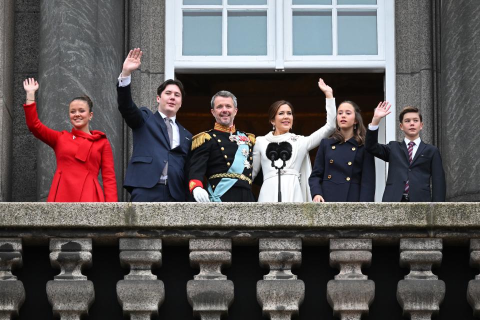 Princess Isabella, Prince Christian, King Frederik X, Queen Mary of Denmark, Princess Josephine of Denmark and Prince Vincent of Denmark wave to the crowd after a declaration of the King's accession to the throne, from the balcony of Christiansborg Pala