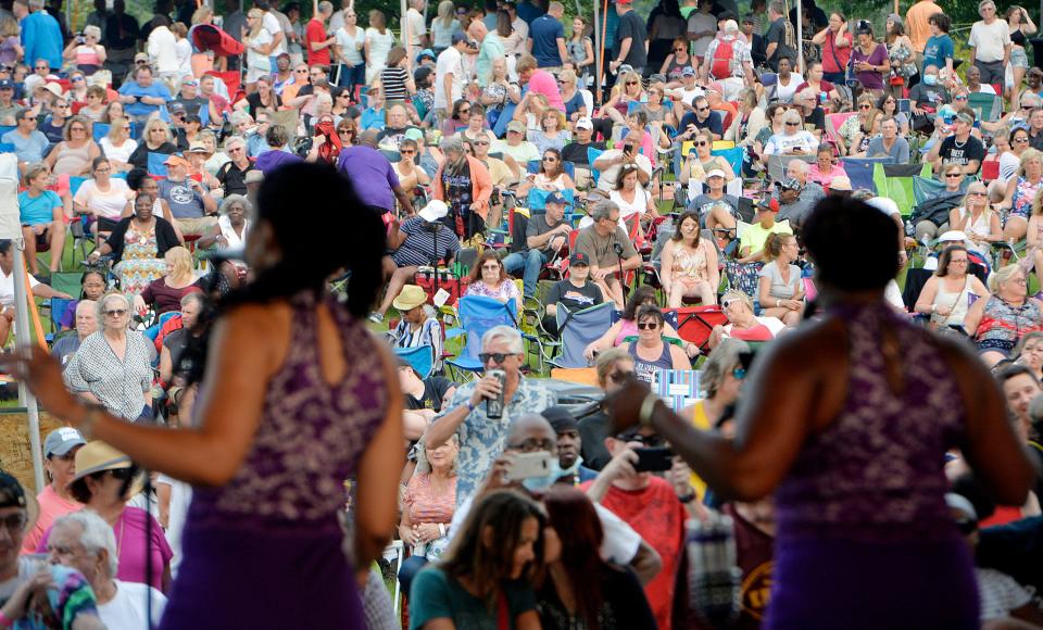 Fans listen to the Breeze Band perform during ErieBank 8 Great Tuesdays on July 20, 2021, at the Highmark Amphitheater in Erie.