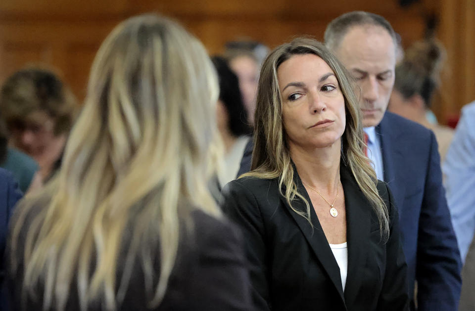 All stand as the jury files out to the courtroom, to start their fifth day of deliberations in the murder trial for Karen Read in Norfolk Superior Court in Dedham, Mass., Monday, July 1, 2024. (Pat Greenhouse/The Boston Globe via AP, Pool)