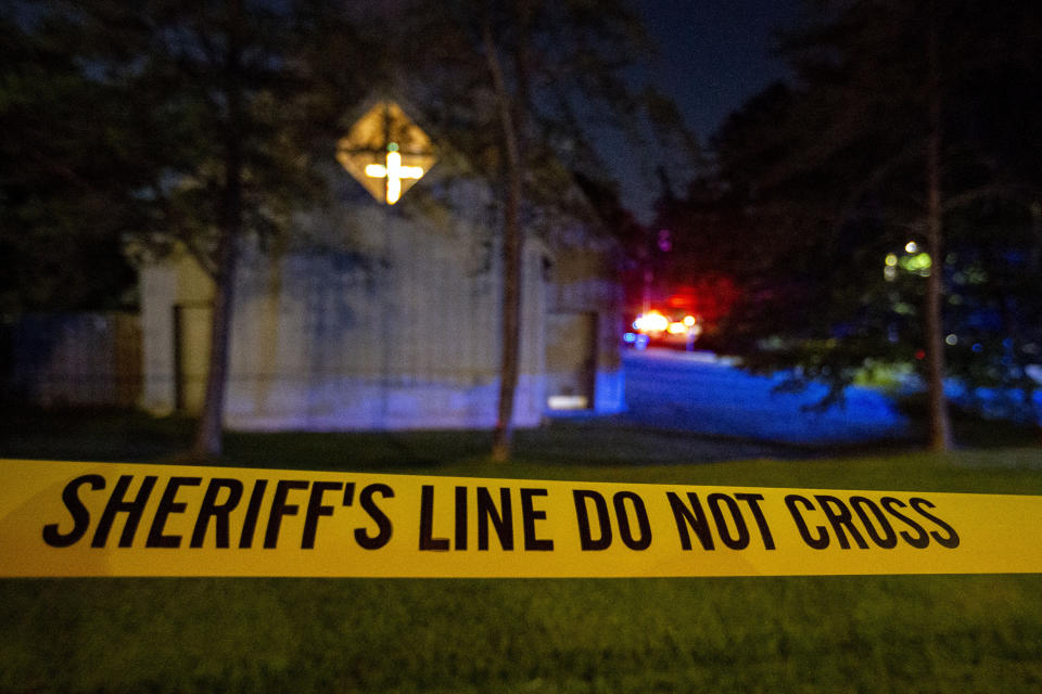 Police barricade off the area after a shooting at the Saint Stevens Episcopal Church on Thursday, June 16, 2022 in Vestavia, Ala. (AP Photo/Butch Dill)