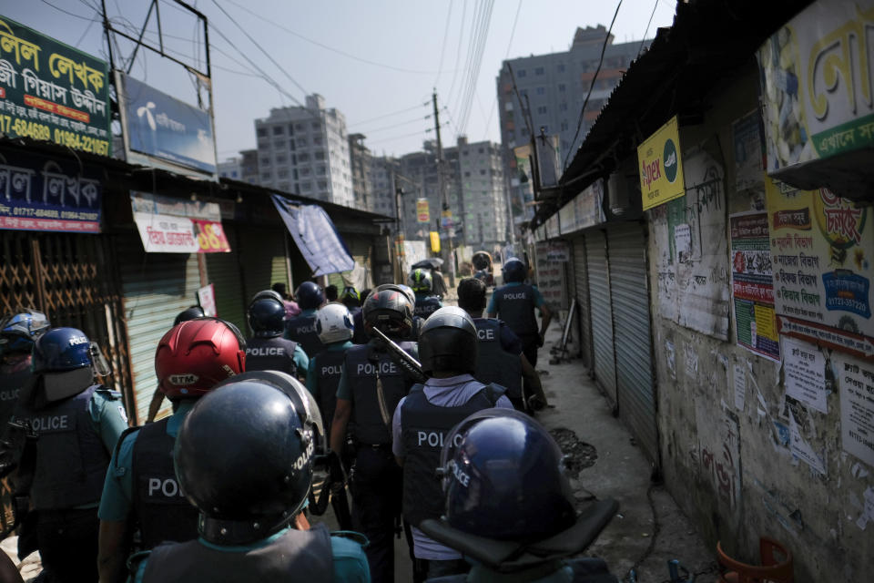 Police look for activists of main opposition Bangladesh Nationalist Party (BNP) who were trying to enforce a three-day blockade in Dhaka, Bangladesh, Tuesday, Oct.31, 2023. BNP has called for country-wide blockade to demand the resignation of Prime Minister Sheikh Hasina and the transfer of power to a non-partisan caretaker government to oversee general elections. (AP Photo/Mahmud Hossain Opu)