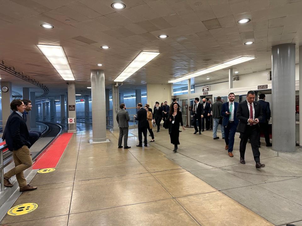 Senators and staff exiting a subway in the Capitol basement. Democratic Sens. Alex Padilla of California, Ed Markey of Massachusetts, and Richard Blumenthal of Connecticut can all be seen in this photo.