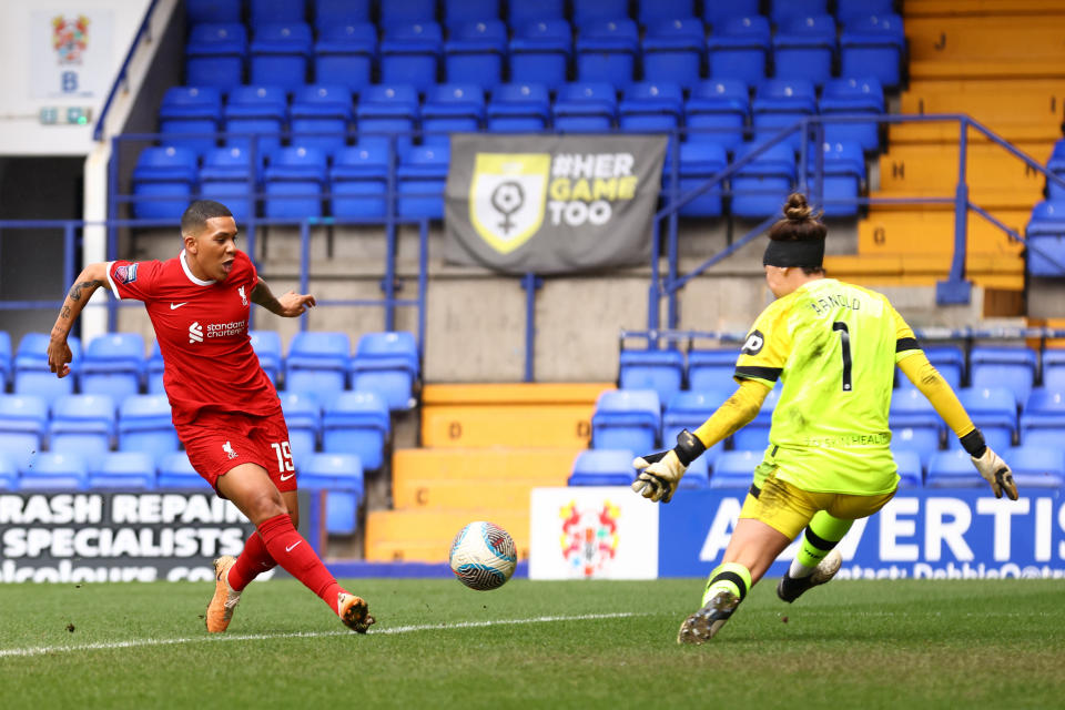 BIRKENHEAD, ENGLAND - MARCH 17: Shanice van de Sanden of Liverpool has a shot on goal saved by Mackenzie Arnold of West Ham during the Barclays Women's Super League match between Liverpool FC  and West Ham United at Prenton Park on March 17, 2024 in Birkenhead, England.(Photo by Gary Oakley/Getty Images)