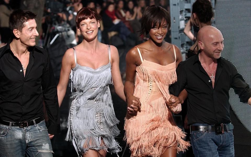 Linda Evangelista and Naomi Campbell walking in a Dolce & Gabana runway show in 2003 (Getty Images)