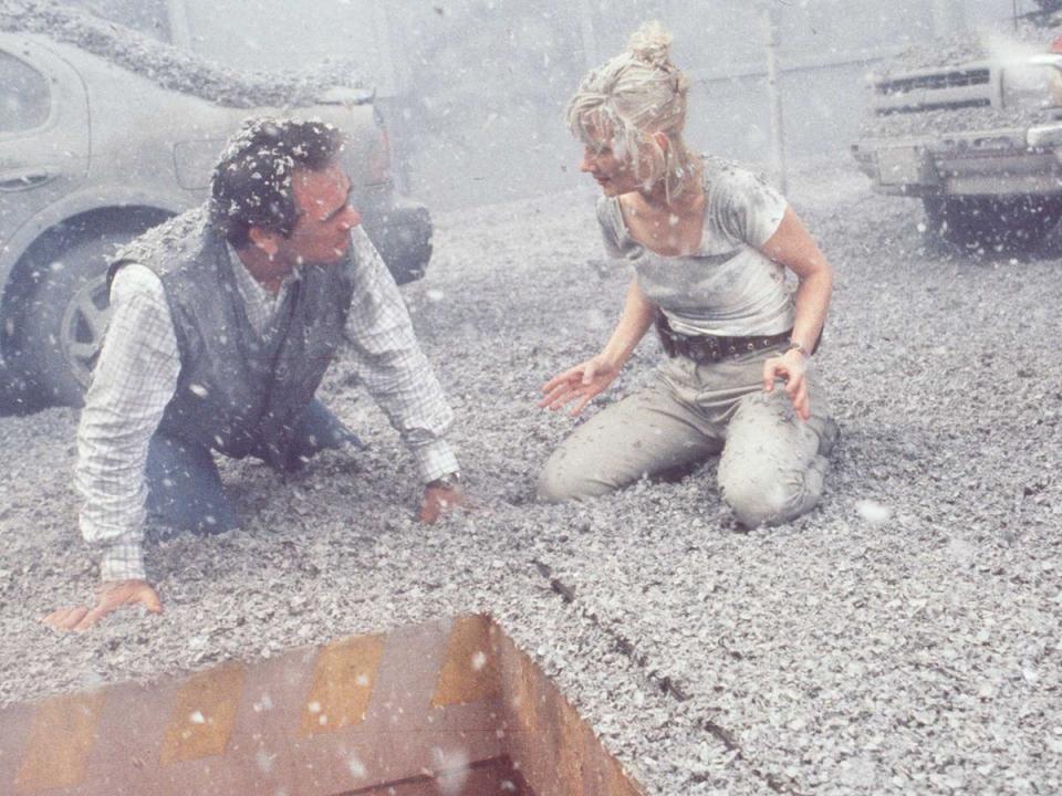 Heche with Tommy Lee Jones in ‘Volcano’ (Getty)