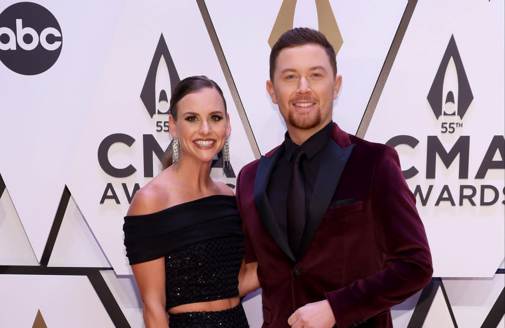 Scotty McCreery and wife Gabi are expecting their first child together credit:Bang Showbiz