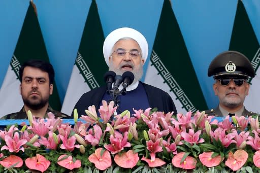 Iranian President Hassan Rouhani, seen here in April 2019 addressing a military ceremony, will reportedly announce retaliatory measures against the United States for withdrawing from a multinational nuclear deal