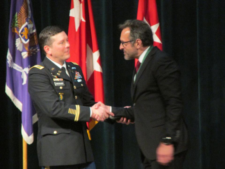 Retired Lt. Col. Roger Carstens is inducted as a distinguished member of the Special Forces Regiment during a cermony Thursday, April 20, 2023, at Fort Bragg.