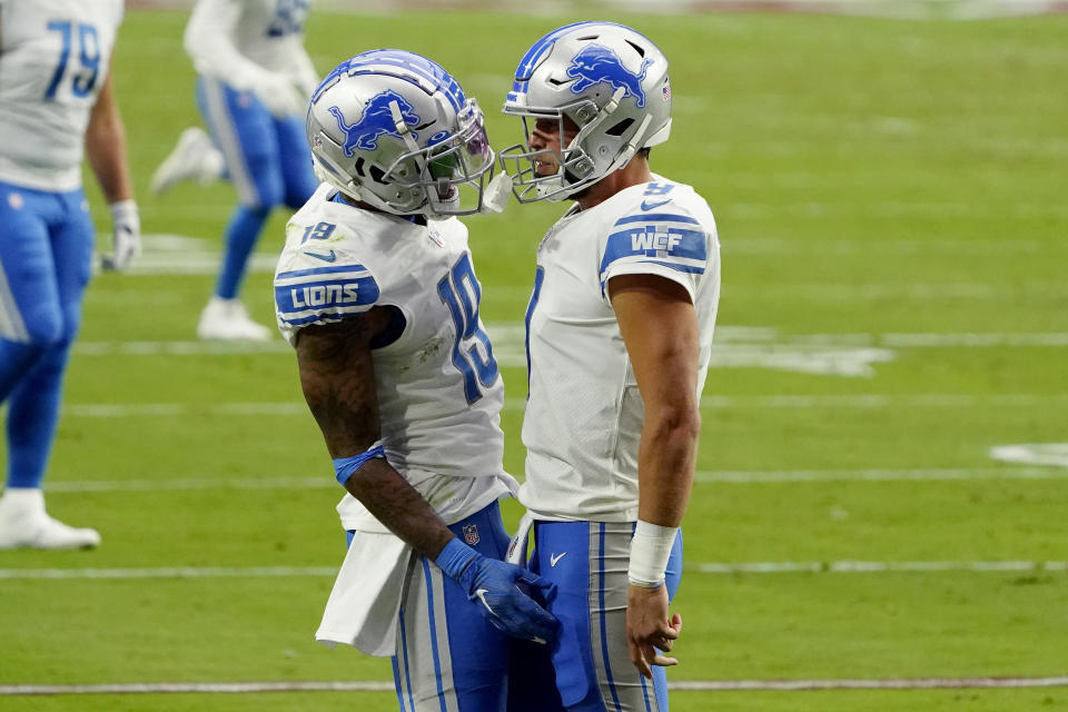 Detroit Lions wide receiver Kenny Golladay celebrate his touchdown catch with quarterback Matthew Stafford during the first half of an NFL football game against the Arizona Cardinals, Sunday, Sept. 27, 2020, in Glendale, Ariz. (AP Photo/Rick Scuteri)