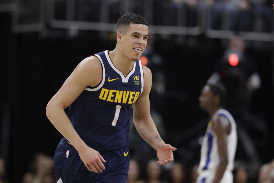 Denver Nuggets' Michael Porter Jr. reacts during the second half of the team's NBA basketball game against the Indiana Pacers, Thursday, Jan. 2, 2020, in Indianapolis. Denver won 124-116. (AP Photo/Darron Cummings)