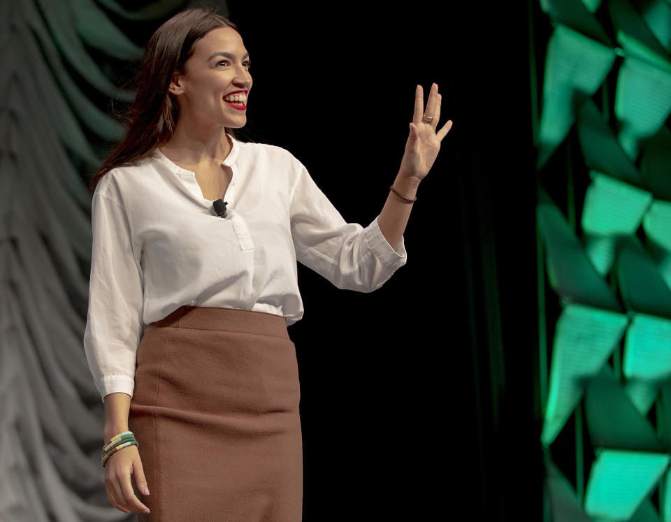 Rep. Alexandria Ocasio-Cortez, D-New York, waves to the audience during South by Southwest on Saturday, March 9, 2019, in Austin, Texas. Texas is an early primary state, but the real draw of the South by Southwest Festival in Austin for Democrats is face time with the party's ascendant young and liberal wing. (Nick Wagner/Austin American-Statesman via AP)