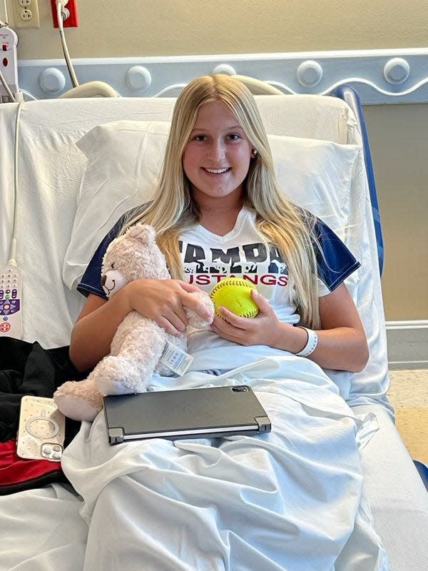 American Heritage-Delray softball’s starting pitcher Aubrey Wurst said that battling a 10-inch tumor taught her that “adversity isn’t giving up a home run or walking a few kids.”