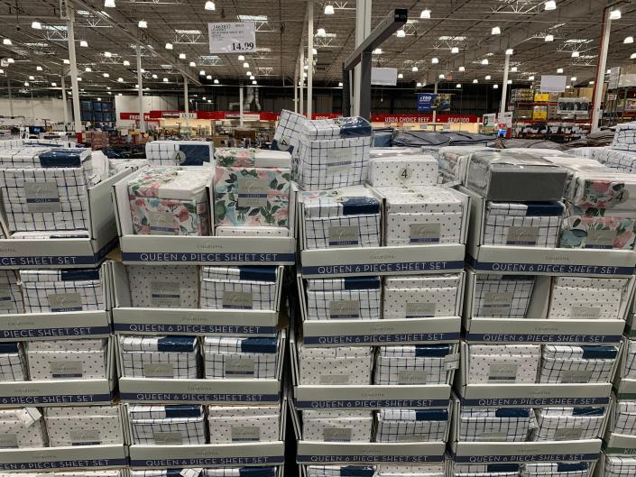 sheet sets stacked in boxes at costco