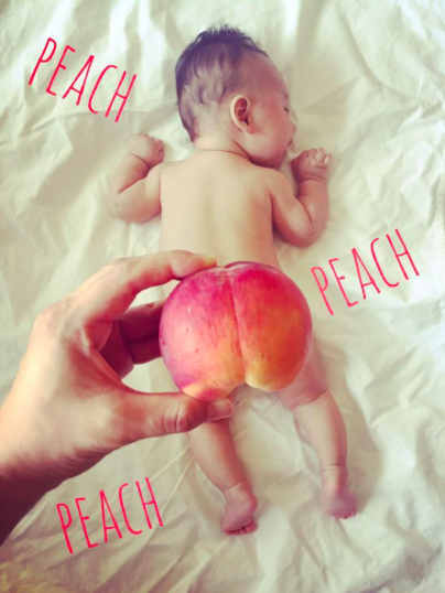 Parents in Japan are sharing pictures of their baby's bottom covered by a peach. (Photo: Instagram/aska.xoxo)