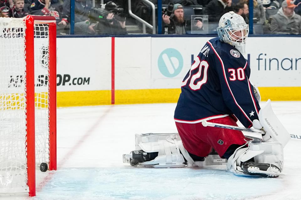 Jan 2, 2024; Columbus, Ohio, USA; Columbus Blue Jackets goaltender Spencer Martin (30) gives up a goal to Boston Bruins defenseman Kevin Shattenkirk (12) during the second period of the NHL hockey game at Nationwide Arena.