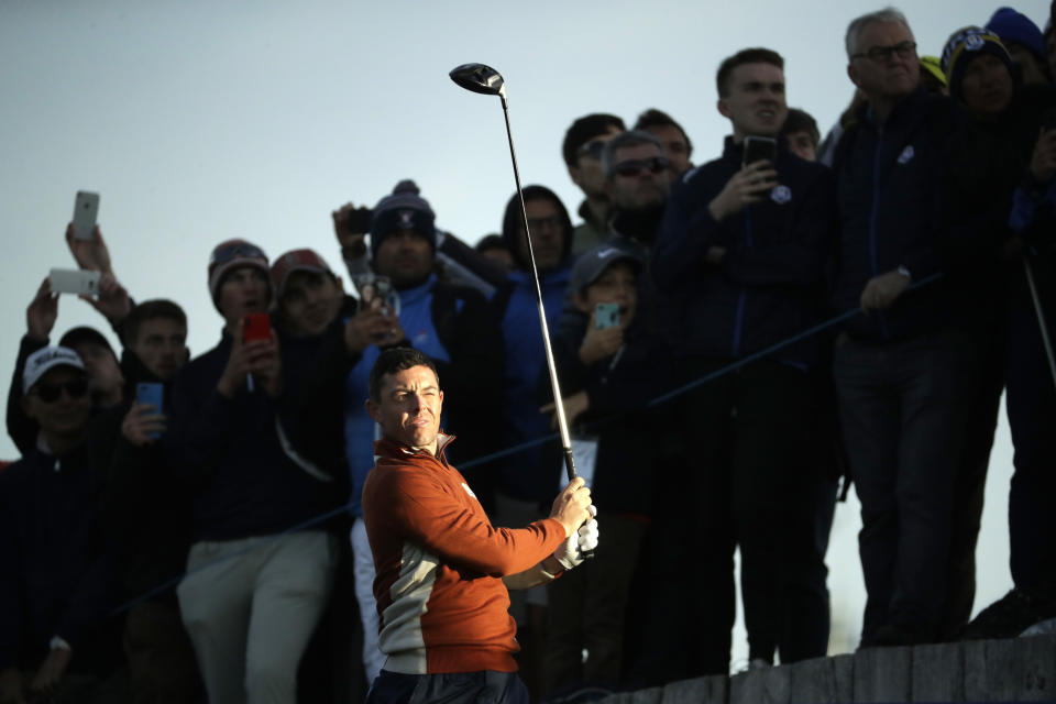 FILE - In this Saturday, Sept. 29, 2018 file photo, Europe's Rory McIlroy plays from the 3rd tee during a fourball match on the second day of the 42nd Ryder Cup at Le Golf National in Saint-Quentin-en-Yvelines, outside Paris, France. McIlroy said on Tuesday Nov. 13, 2018, at the World Tour Championship he intends to play only two full-field European Tour events in the first half of 2019 because of changes in the tournament schedule. (AP Photo/Matt Dunham, File)