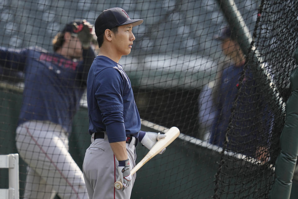 Boston Red Sox's Masataka Yoshida watches during batting practice before a baseball game against the Cleveland Guardians, Tuesday, June 6, 2023, in Cleveland. (AP Photo/Sue Ogrocki)