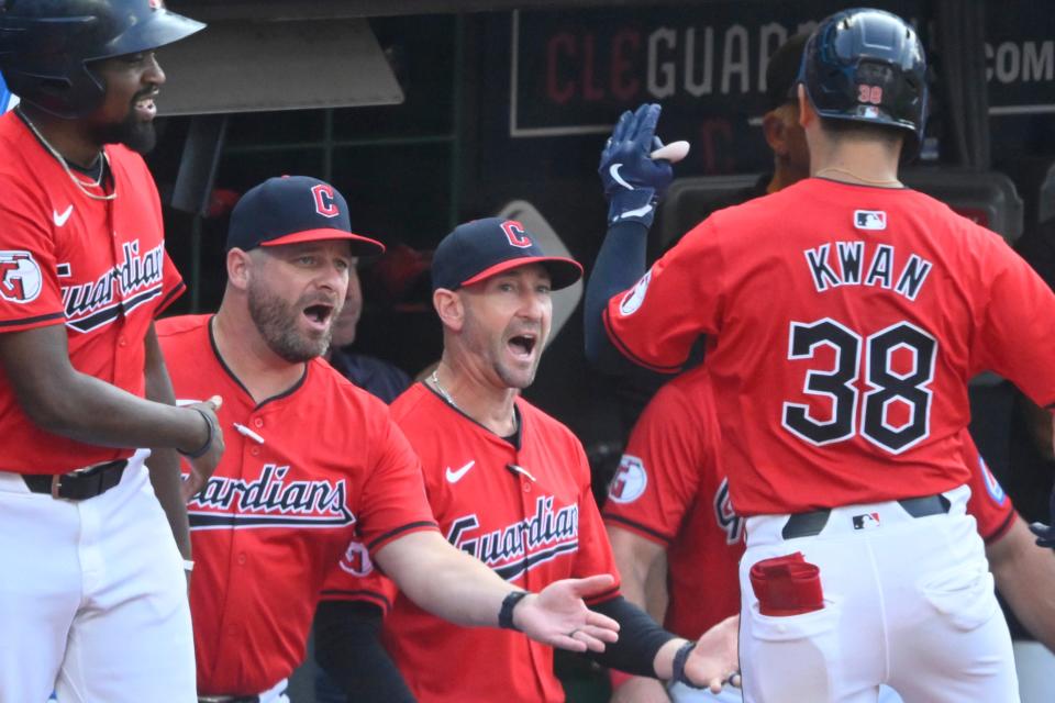 Jul 23, 2024; Cleveland, Ohio, USA; Cleveland Guardians manager Stephen Vogt (12) celebrates with designated hitter Steven Kwan (38) in the third inning against the Detroit Tigers at Progressive Field. Mandatory Credit: David Richard-USA TODAY Sports