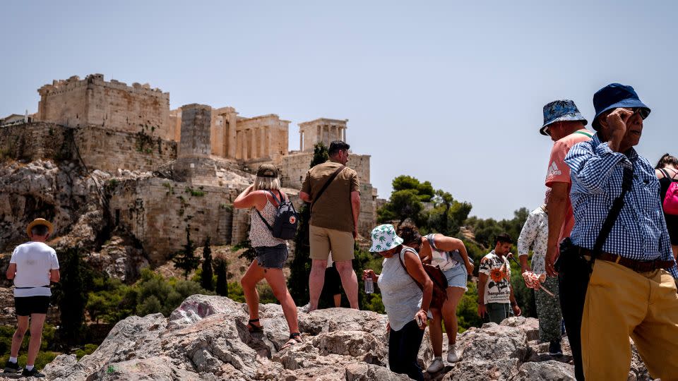 Authorities in Greece warned visitors not to underestimate the heat.  -Hilary Swift/Bloomberg/Getty Images