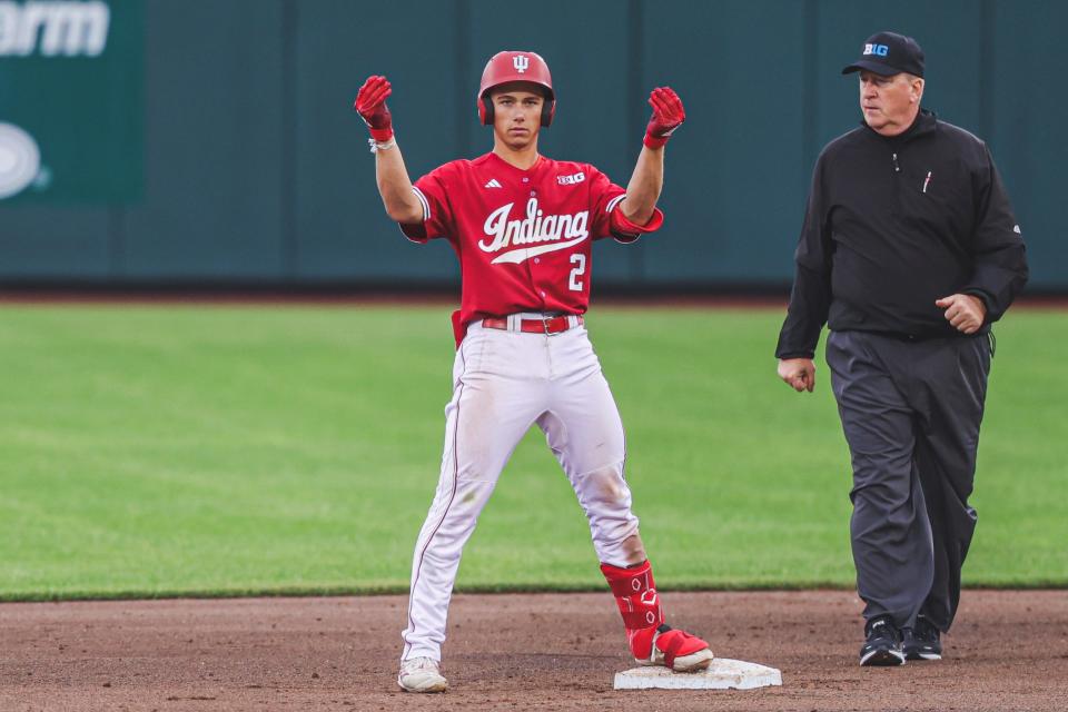 Indiana baseball second basemen Jasen Oliver celebrates during a game at Charles Schwab Field in Nebraska.