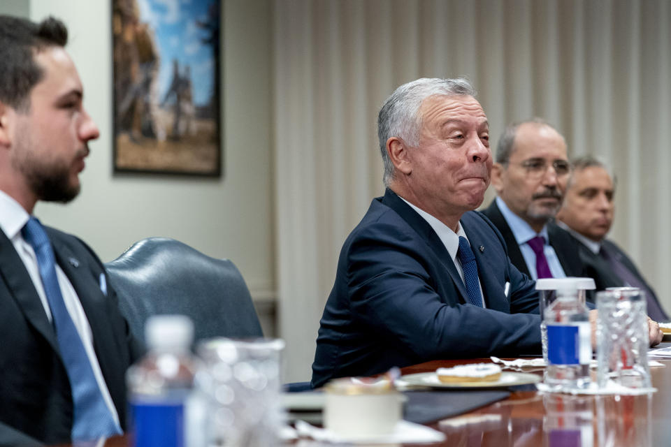 Jordan's King Abdullah II bin Al-Hussein, accompanied by Crown Prince of Jordan Hussein bin Abdullah, left, speaks during a meeting with Secretary of Defense Lloyd Austin at the Pentagon in Washington, Thursday, May 12, 2022. (AP Photo/Andrew Harnik)