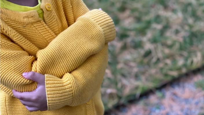 Young person wearing jumper