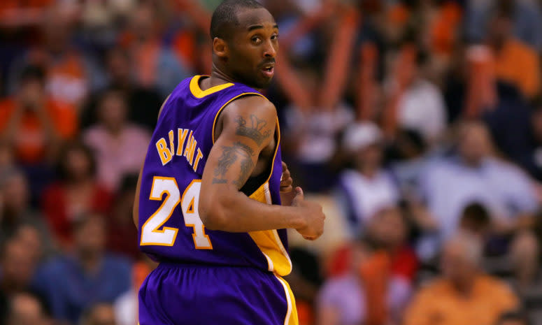 Kobe Bryant runs down the court during a Lakers game.