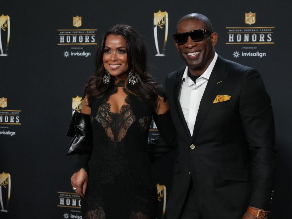 Deion Sanders and his girlfriend, Tracey Edmonds, attend the 2023 NFL Honors award show.