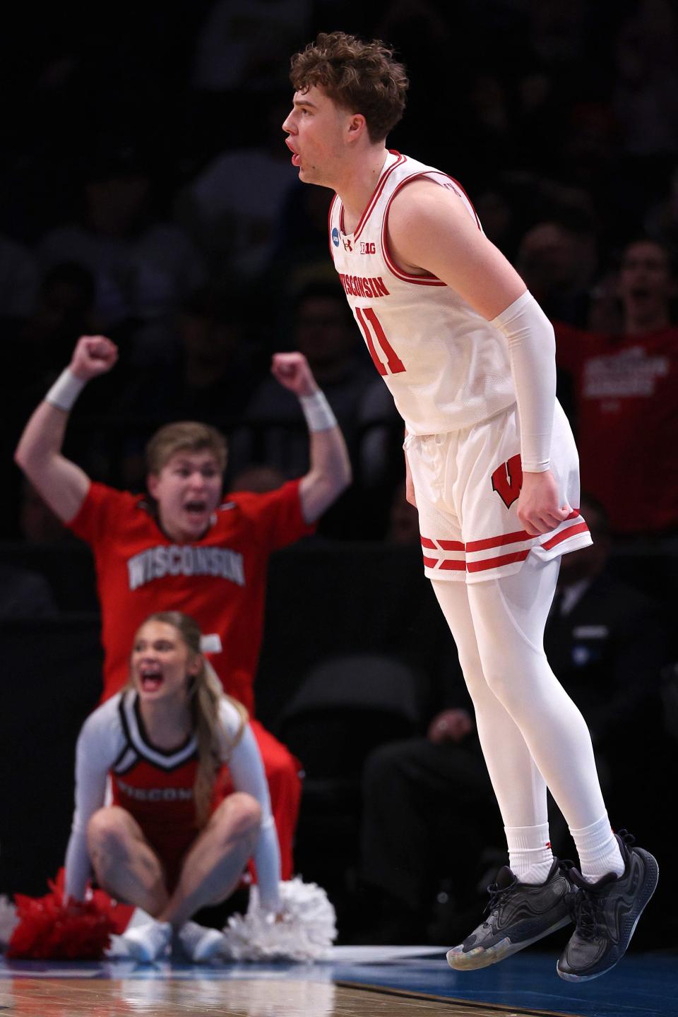 Max Klesmit of the Wisconsin Badgers reacts during the second half against the James Madison Dukes in the first round of the NCAA Men's Basketball Tournament at Barclays Center on March 22, 2024, in Brooklyn, New York.