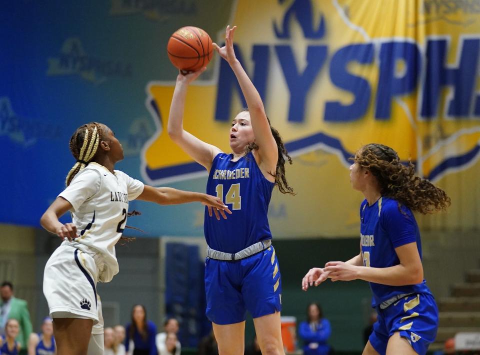 Webster-Schroeder's Sarah Ferruzza puts up a shot in the girls Class AA state semifinal game against Baldwin at Hudson Valley Community College in Troy, on Friday, March 17, 2023.