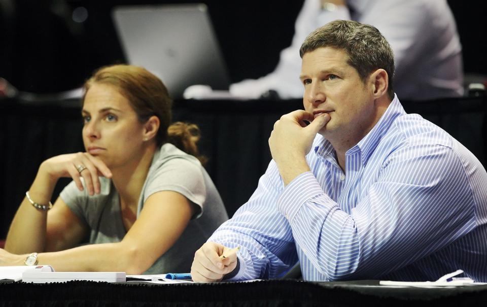 FGCU coach Karl Smesko, right, and assistant coach Nicki Collen scout Florida State University during FSU's game against Alabama State University on Saturday in the NCAA Division I Women's Basketball Championship first round game at the Donald L. Tucker Civic Center in Tallahassee. FGCU beat OKU 75-67.