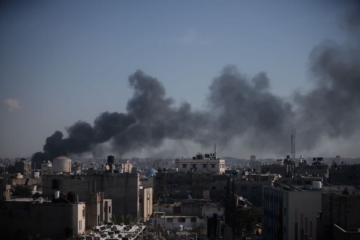 Smoke rises after an Israeli strike in Khan Younis, Gaza Strip on Saturday (AP)