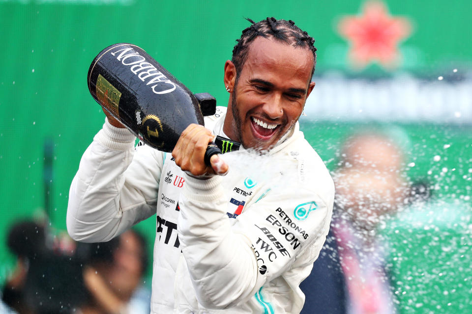 MEXICO CITY, MEXICO - OCTOBER 27: Race winner Lewis Hamilton of Great Britain and Mercedes GP celebrates on the podium during the F1 Grand Prix of Mexico at Autodromo Hermanos Rodriguez on October 27, 2019 in Mexico City, Mexico. (Photo by Mark Thompson/Getty Images)