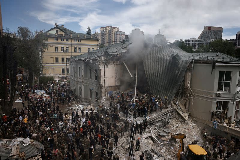 FILE PHOTO: Rescuers work at Ohmatdyt Children's Hospital that was damaged during Russian missile strikes, in Kyiv