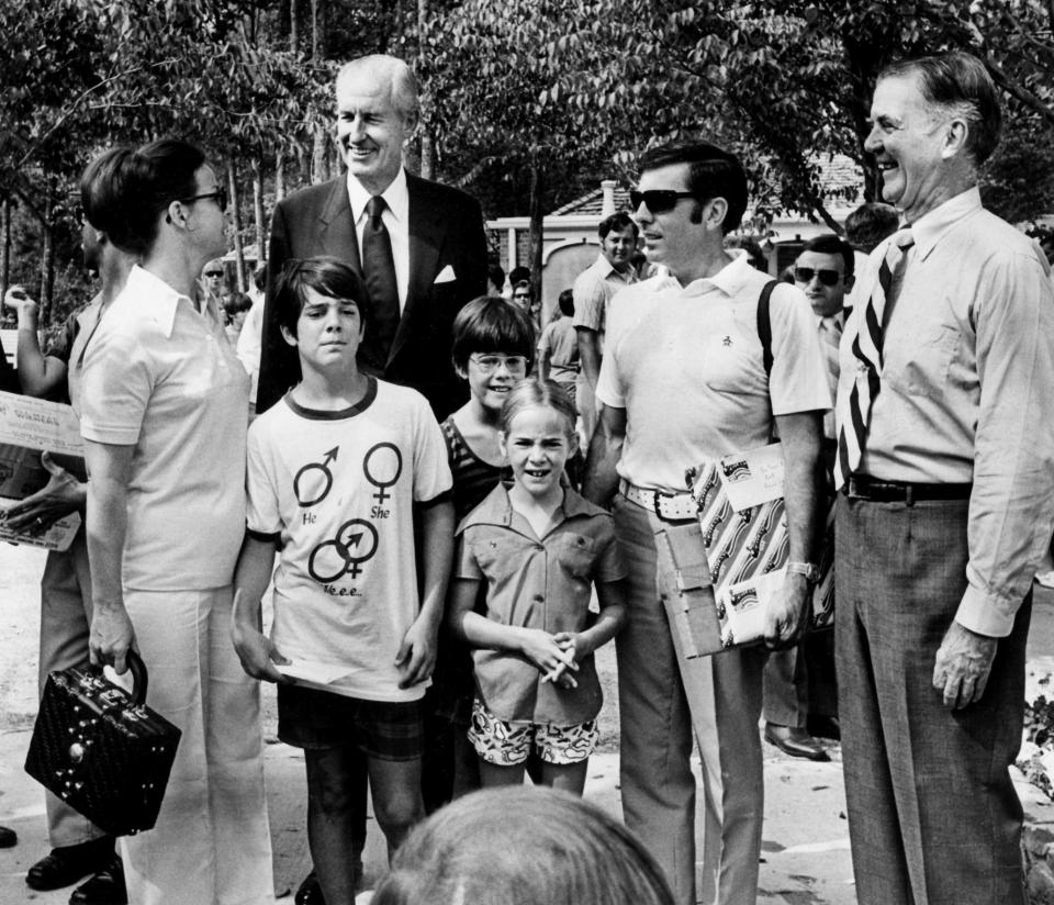 Mr. and Mrs. Nile Bowman and their three children, Scott, 11, Danny, 10, and Ramona, 8, center, of Johnson City, Tenn., are welcomed as the one millionth visitors to the Opryland U.S.A. theme park Aug. 16, 1972. Extending the welcome is William C. Weaver, back left, chief executive officer of National Life and Accident Insurance Co., and chairman-elect G. Daniel Brooks, right, of the boards of NLT Corp. and WSM Inc.
