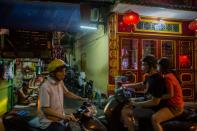 Tucked away in winding alleys, nestled under new condo developments or sandwiched between street food stalls and shops, the tiny houses are easily missed by the unattentive passerby