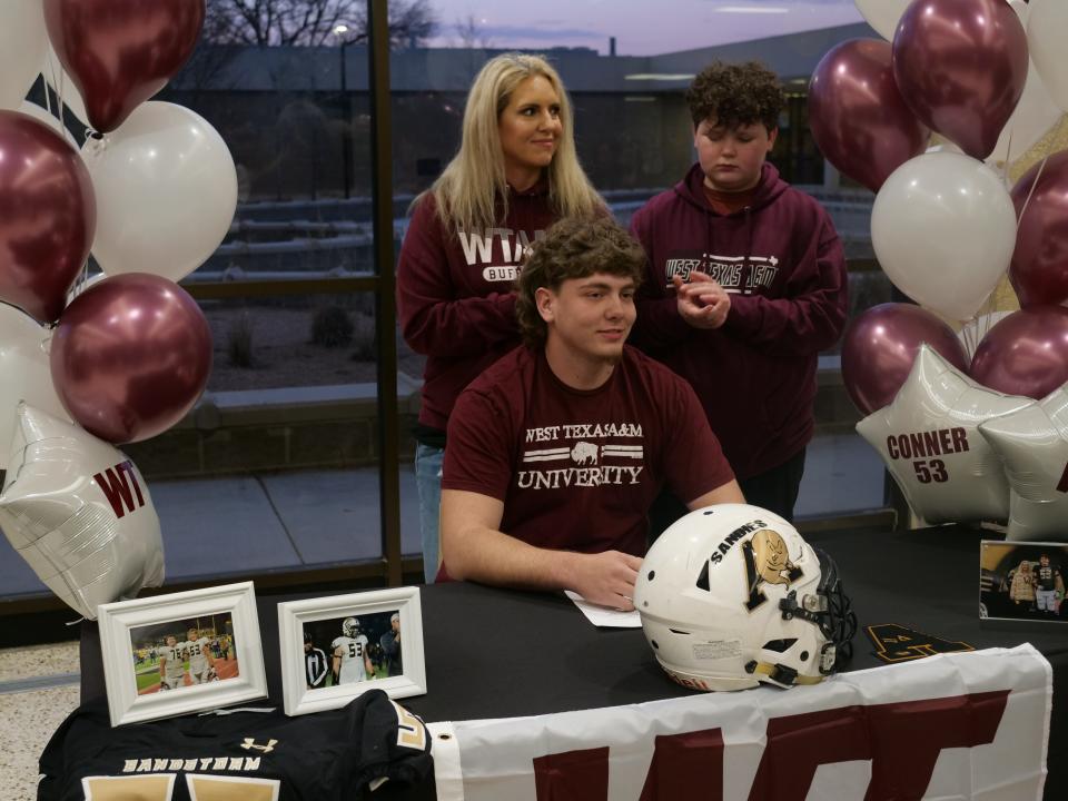 AHS' Conner Marricle (seated) signed his National Letter of Intent to play college football for West Texas A&M University as part of National Signing Day on Wednesday, February 1st, 2023 at Amarillo High School.