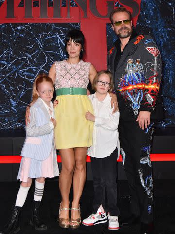 <p>ANGELA WEISS/AFP via Getty Images</p> Marnie Rose, Lily Allen, Ethel and David Harbour in New York City in May 2022