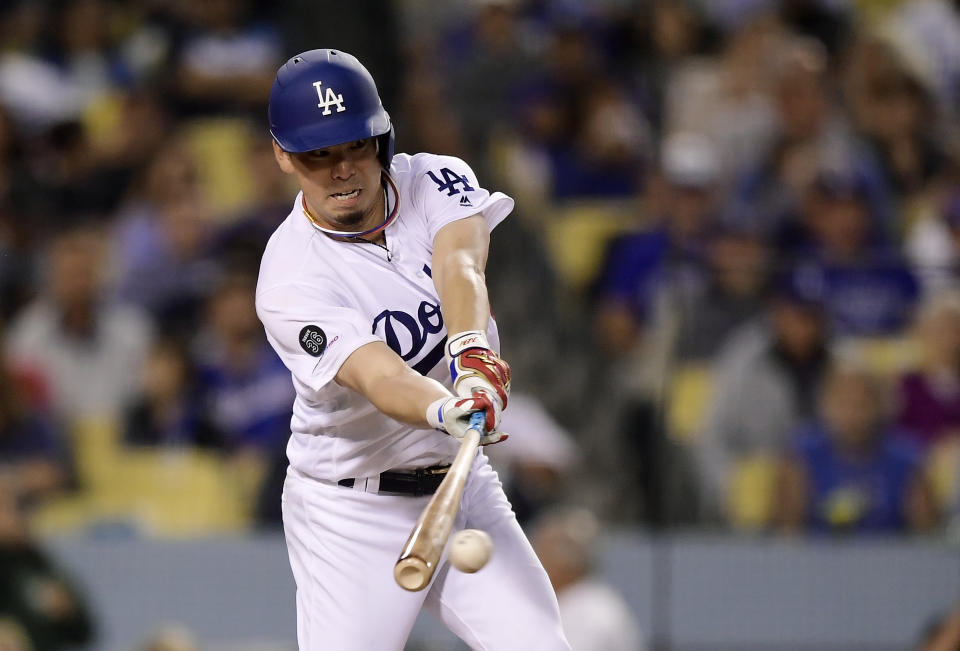 Los Angeles Dodgers' Kenta Maeda, of Japan, hits a single during the third inning of a baseball game against the San Francisco Giants, Monday, June 17, 2019, in Los Angeles. (AP Photo/Mark J. Terrill)