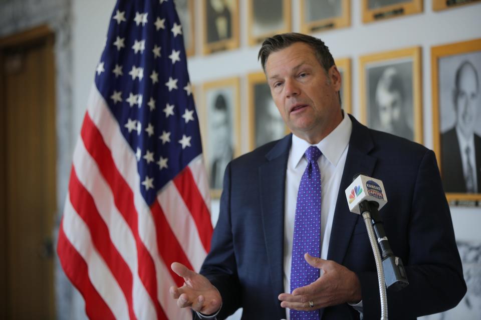 Kansas Attorney General Kris Kobach sent a letter to big businesses warning them to abandon racial preferences in employment decisions, but his office has provided no guidance to state government about the issue.