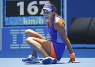 Ana Ivanovic of Serbia falls during her women's singles first round match against Lucie Hradecka of Czech Republic at the Australian Open 2015 tennis tournament in Melbourne January 19, 2015. Ivanovic lost the match to Hradecka. REUTERS/Issei Kato (AUSTRALIA - Tags: SPORT TENNIS)