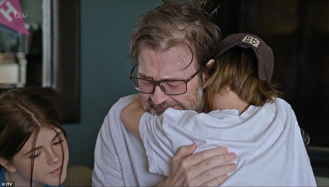 derek draper hugging his son